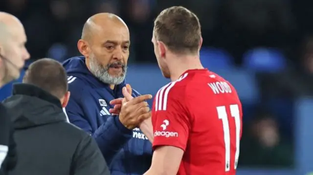 Nuno Espirito Santo shakes hands with Chris Wood