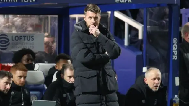 Rob Edwards looks on from the Luton dugout