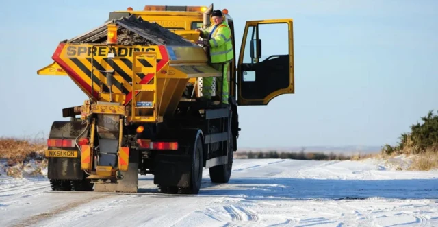 Gritting snow covered roads