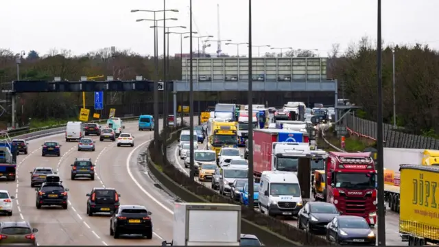 Traffic on busy england motorway during spell of bad weather