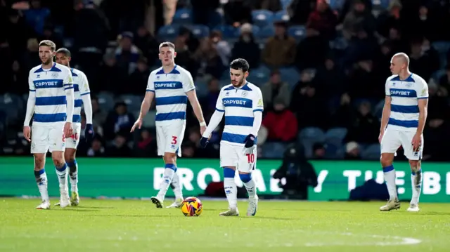 QPR players look dejected after conceding to Luton on the stroke of half-time