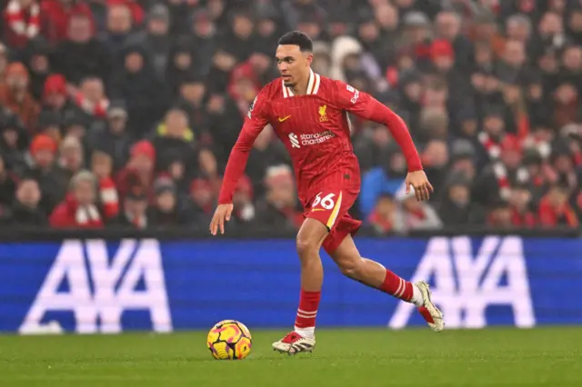 Trent Alexander-Arnold of Liverpool runs with the ball