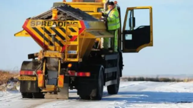 A gritter lorry on an icy road