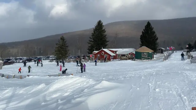 The White Grass lodge, seen during a sun break on Monday