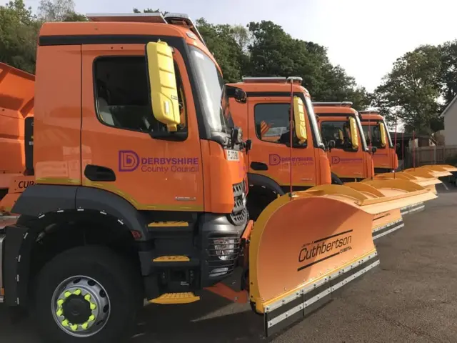 A row of orange gritters