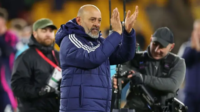 Nuno Espirito Santo, Manager of Nottingham Forest, acknowledges the fans