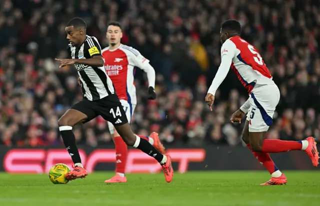 Alexander Isak runs with the ball