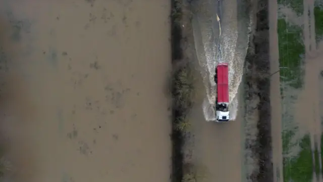 A lorry makes its way through flood water on January 06, 2025 in Mountsorrel, Leicestershire