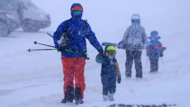 Skiers brave the snow at Glenshee Ski Centre in Scotland