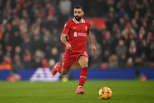 Mohamed Salah running with the ball