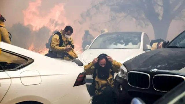 Firefighters preparing their gear