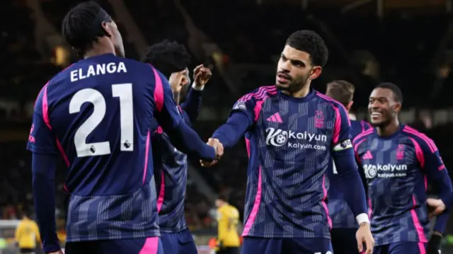 Morgan Gibbs-White of Nottingham Forest celebrates with teammate Anthony Elanga after scoring