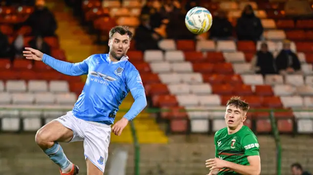 Action from Glentoran v Larne