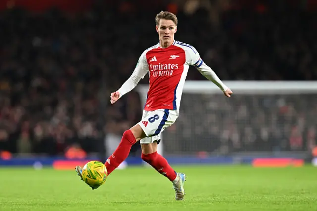 Martin Odegaard of Arsenal controls the ball