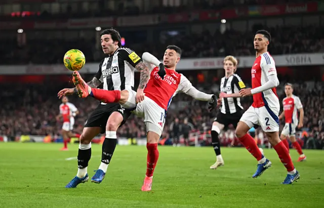 Gabriel Martinelli of Arsenal battles for possession with Sandro Tonali