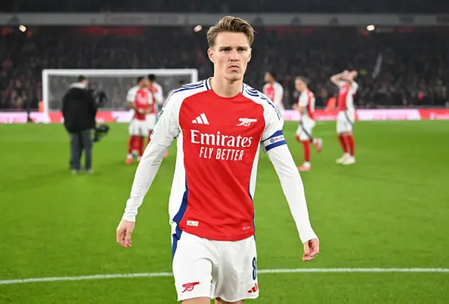 Martin Odegaard of Arsenal looks on