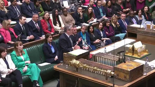 A wide shot of Starmer at the dispatch box in the House of Commons