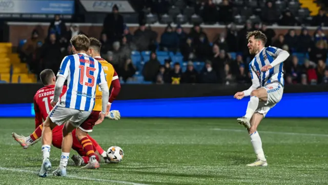 Kilmarnock's Marley Watkins (R) has a shot saved by Motherwell's Aston Oxborough (L) during a William Hill Premiership match between Kilmarnock and Motherwell