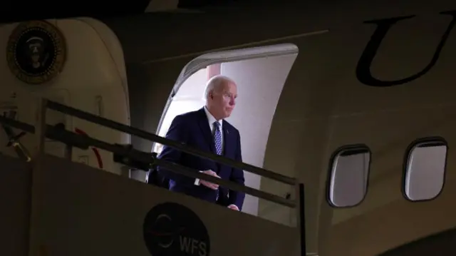 US President Joe Biden steps out of Air Force One at Los Angeles on 7 January