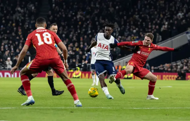 Tottenham Hotspur's Yves Bissouma competing with Liverpool's Alexis Mac Allister