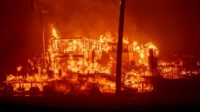 A structure burns during the Palisades Fire in the Pacific Palisades neighborhood.