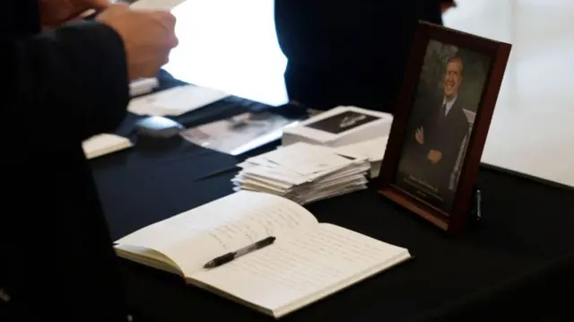 A book of condolences was set up for people to sign ahead of President Carter's casket entering the Capitol rotunda