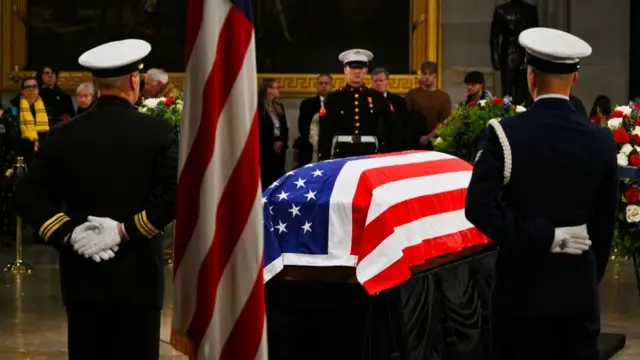 The flag-draped casket of former US president Jimmy Carter, as he lies in state in the US Capitol Rotunda in Washington on Wednesday