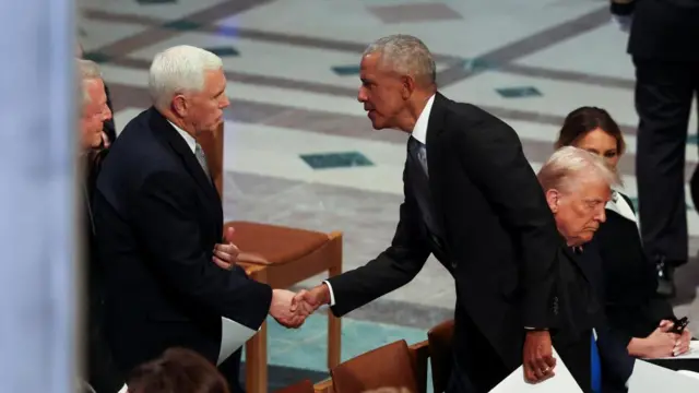 US President Barack Obama shook hands with former US Vice President Mike Pence