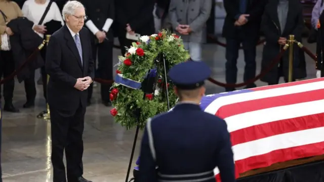 A ceremony was held for President Carter after his body arrived at the US Capitol, which was attended by several lawmakers, including former Republican Senate Majority Leader Mitch McConnell, pictured here