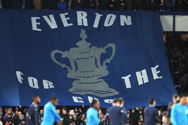 Everton fans display a banner