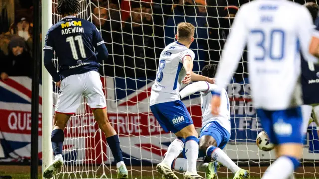 undee’s Oluwaseun Adewumi scores to make it 1-0 during a William Hill Premiership match between Dundee and Rangers  at The Scot Foam Stadium,