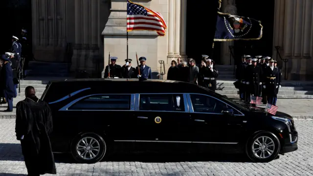 Hearse in front of cathedral