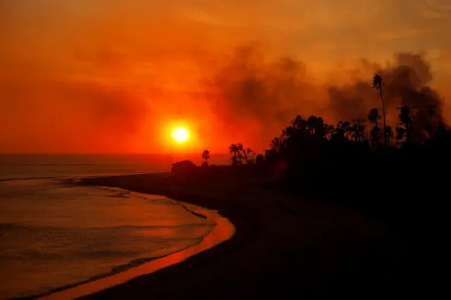 The sun setting over smoky Malibu on Wednesday evening