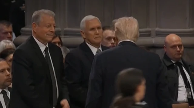 Mike Pence and Donald Trump shake hands