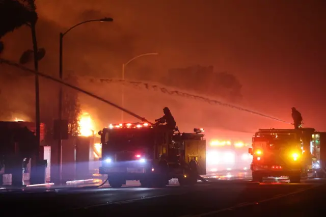 Firefighters continue battling Palisades fire as flames rage across Los Angeles