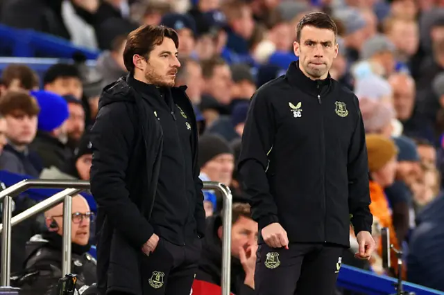 Everton caretaker managers Leighton Baines (L) and Seamus Coleman look on