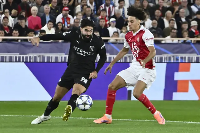 Josko Gvardiol (L) and Monaco's French midfielder #11 Maghnes Akliouche fight for the ball