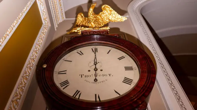 The Ohio Clock outside the Senate Chamber strikes midnight at the U.S. Capitol