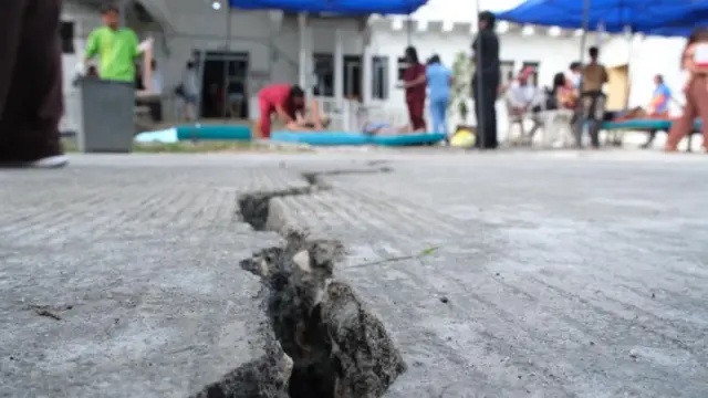 close-up photo of a cracked pavement in Bogo, Cebu, the Philippines after an earthquake