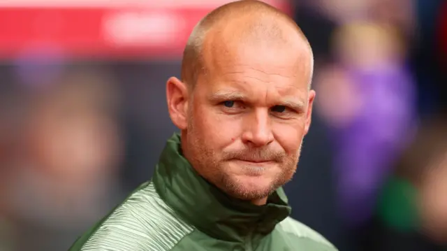 A concerned looking Norwich boss Liam Manning