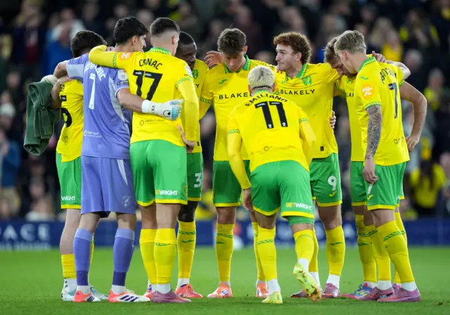 Norwich players huddle