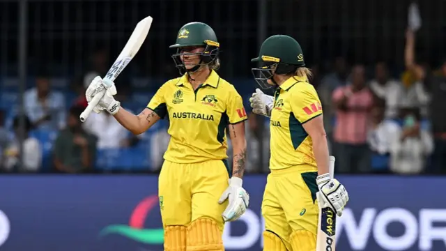 Ash Gardner of Australia celebrates her half century