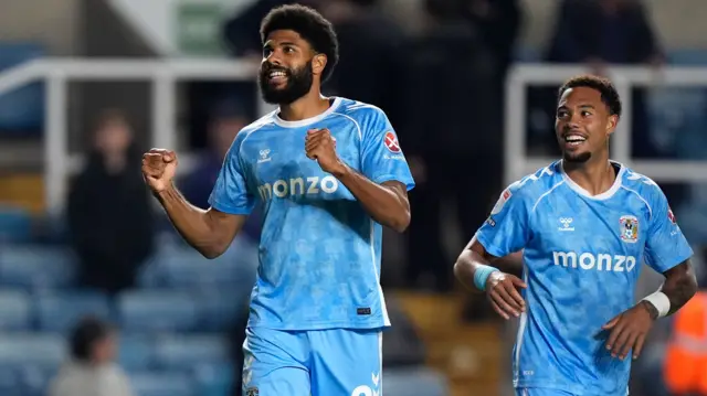 Ellis Simms celebrates scoring