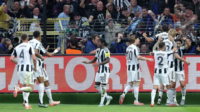Newcastle players celebrate after scoring