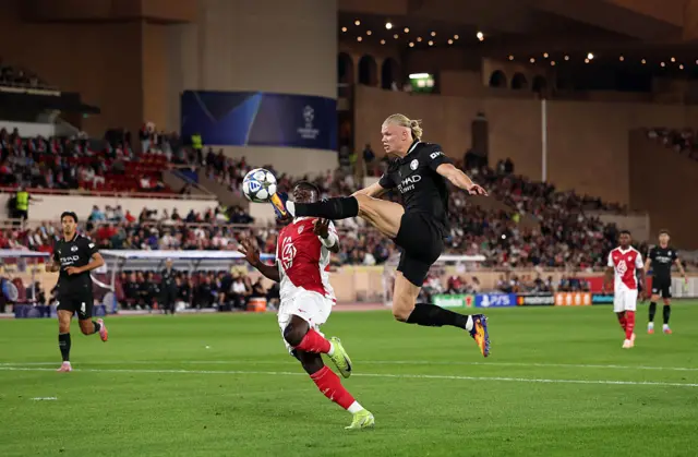 Erling Haaland of Manchester City scores his team's first goal during the UEFA Champions League 2025/26 League Phase MD2 match between AS Monaco and Manchester City at Stade Louis II on Oc