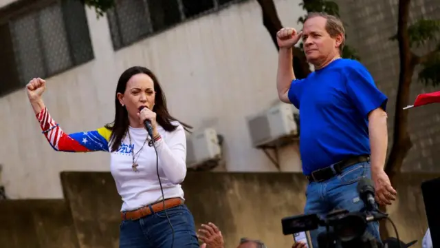 Venezuela opposition leaders Juan Pablo Guanipa and Maria Corina Machado attend a rally, in Caracas, Venezuela, January 9