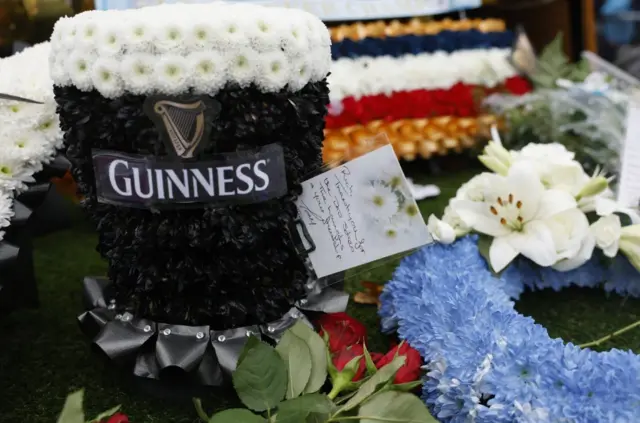Flowers have been crafted as a pint of Guinness in memory of Hatton