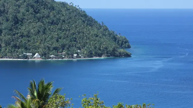 A wide shot of an island resort in the Talaud Islands