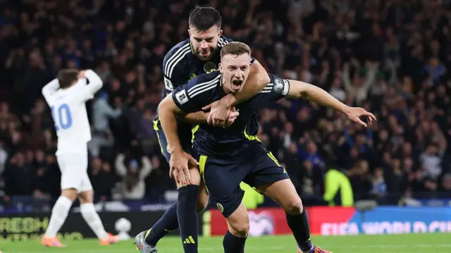 Lewis Ferguson celebrates