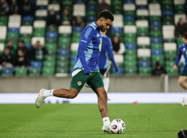 Jamie Reid kicks the ball